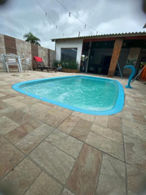 Casa com piscina próximo à praia